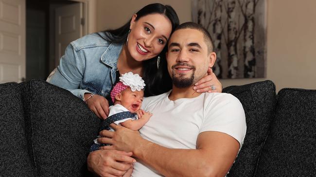 UFC champ Robert Whittaker with baby daughter Lilliana and wife Sofia.