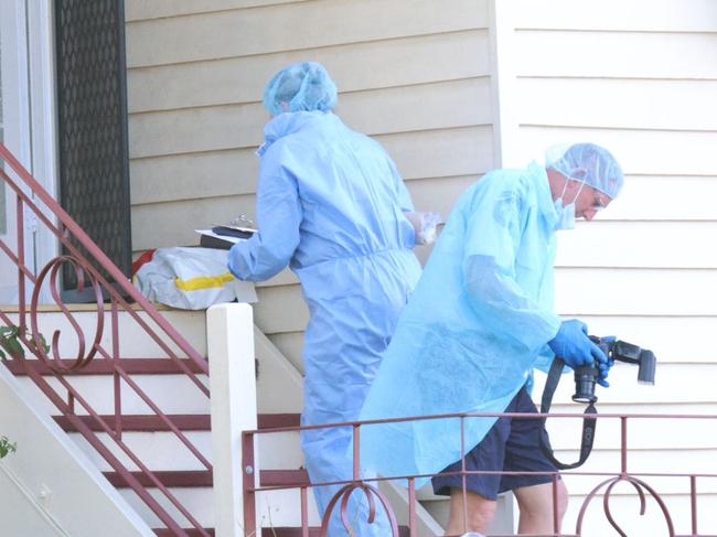Police at the scene where Tayla Cox and baby were found dead in a house on Bean Street. Photo - Steve Vit