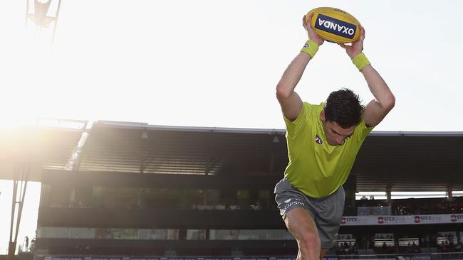 Umpire Matt Stevic bounces the ball. Picture: Getty Images