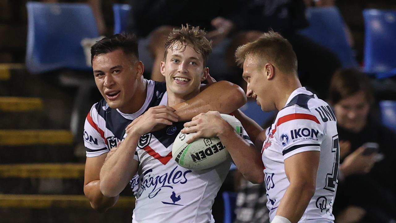 Sam Walker of the Rooster celebrates his try with teammates during the round eight NRL match between the Newcastle Knights and the Sydney Roosters at McDonald Jones Stadium, on May 01, 2021, in Newcastle, Australia. (Photo by Ashley Feder/Getty Images)