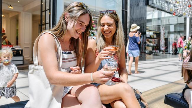 Isabella Leach and Savannah Stouraitis enjoy a Bird In Hand wine at Burnside Village. Picture: AAP / Morgan Sette