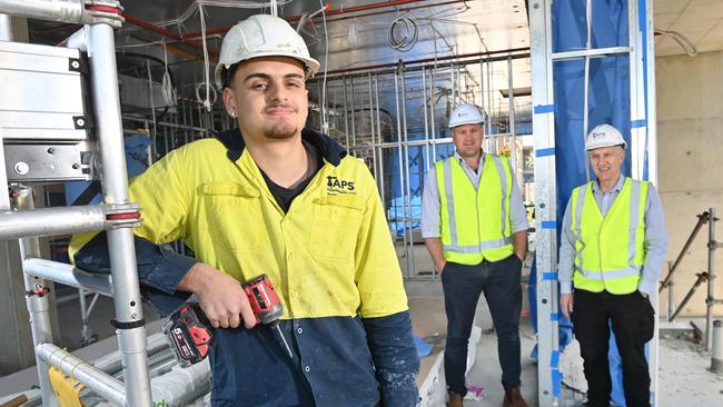 Second Year Apprentice Antony Palazzo with Luke Walsh chief executive officer of TAPS, a group training provider with its compliance manager Graeme Webster. Picture: Keryn Stevens