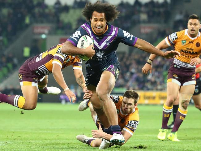 Felise Kaufusi rampages through the Broncos defence for a try. Picture: Getty Images