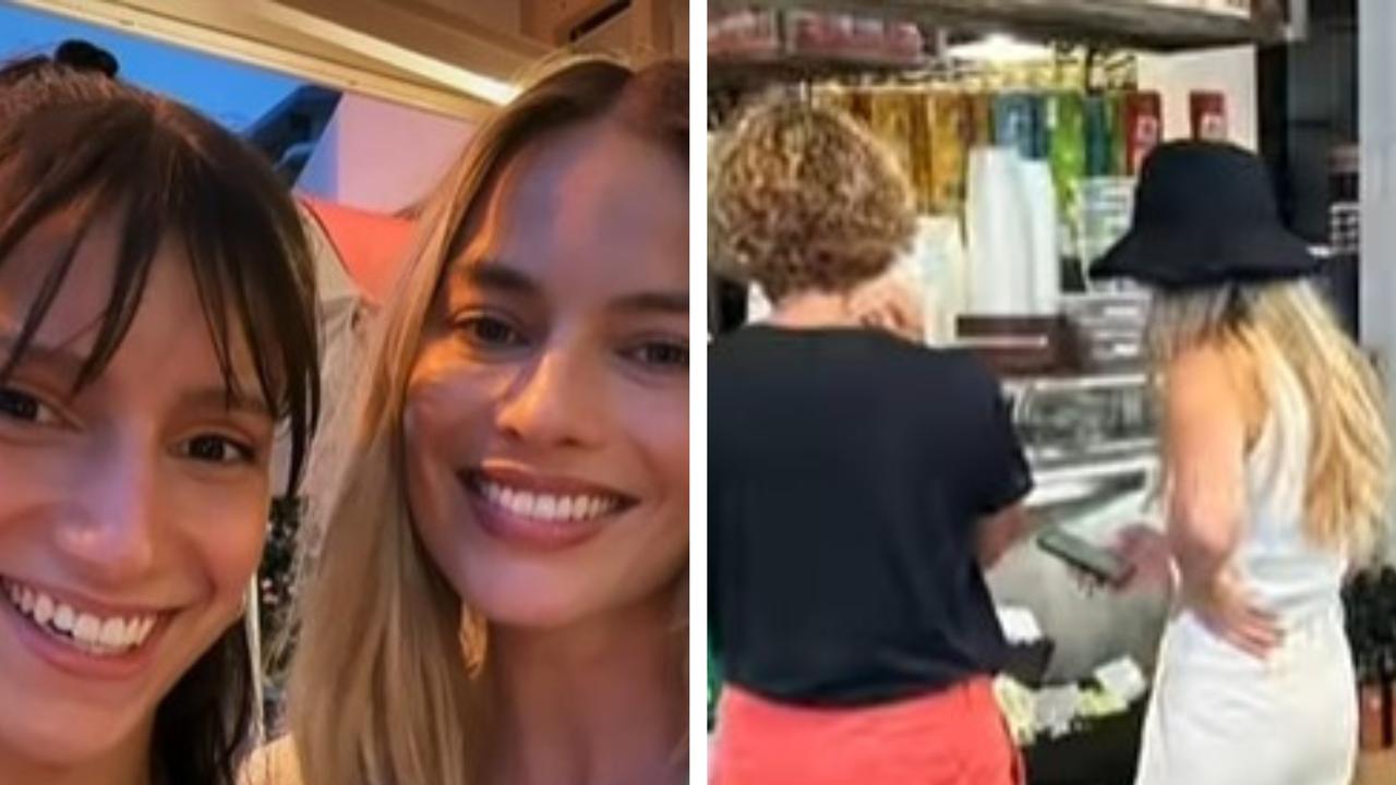 Margot Robbie took pictures with staff at Tommy’s Italian restaurant in Currumbin on Thursday at lunchtime, before she was spied shopping in Southport.