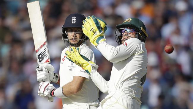 Joe Root gets runs past wicketkeeper Tim Paine. Picture: AP