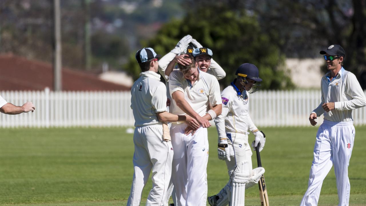 Michael Dowe (centre) celebrates with Western Districts teammates. Picture: Kevin Farmer