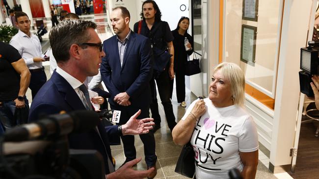 Wendy Archer confronts the NSW Treasurer at Bankstown Central Mall. Picture: Dylan Robinson