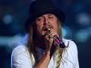Rocker ‘pulls gun’ in trainwreck interview