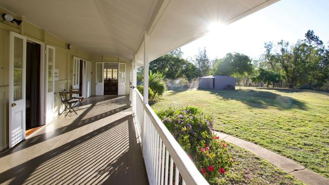 The spacious home boasts a peaceful veranda overlooking the garden.