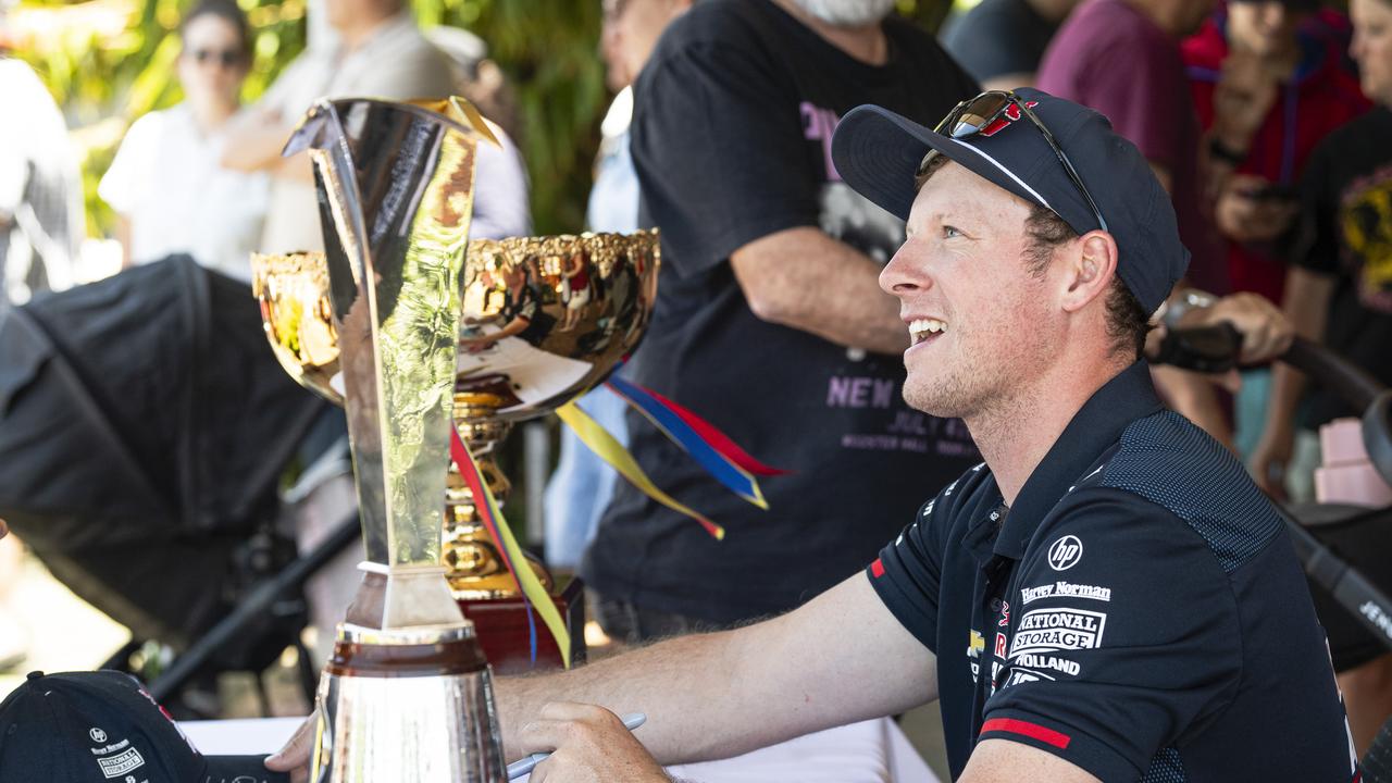 Supercar champion Will Brown signing autographs at Cars Galore in Toowoomba, Sunday, November 24, 2024. Picture: Kevin Farmer