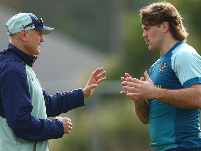 BRISBANE, AUSTRALIA - JUNE 25: Head coach Joe Schmidt and Fraser McReight talk during a Wallabies training session at Ballymore Stadium on June 25, 2024 in Brisbane, Australia. (Photo by Chris Hyde/Getty Images)