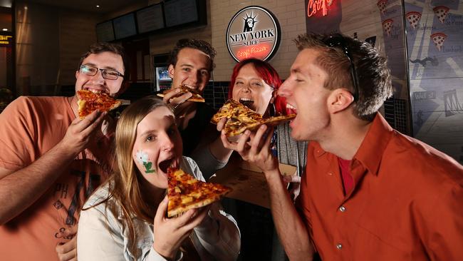 Pizza lovers demonstrate their skills at New York Slice, Brisbane. Picture: Josh Woning.