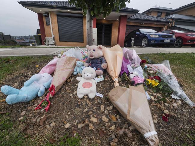 Flowers and toys at Langdon Drive, Mernda. Police are investigating an infant found dead and a woman critically injured at a home in MelbourneÃs outer north on Friday night.Picture:Rob Leeson.