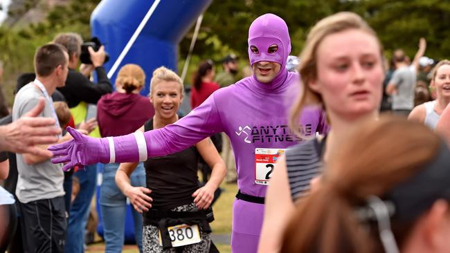 Competitors celebrate after crossing the finish line in 2018. Picture: Troy Snook