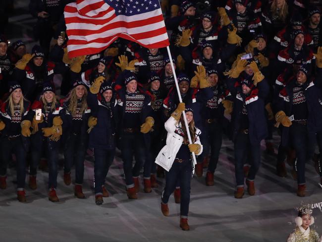 US‘s flag-bearer Erin Hamlin leads Team USA. Picture: AFP