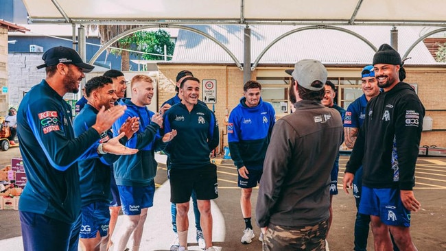 Canterbury players spent Mad Monday feeding the homeless. Pics: Bulldogs Digital