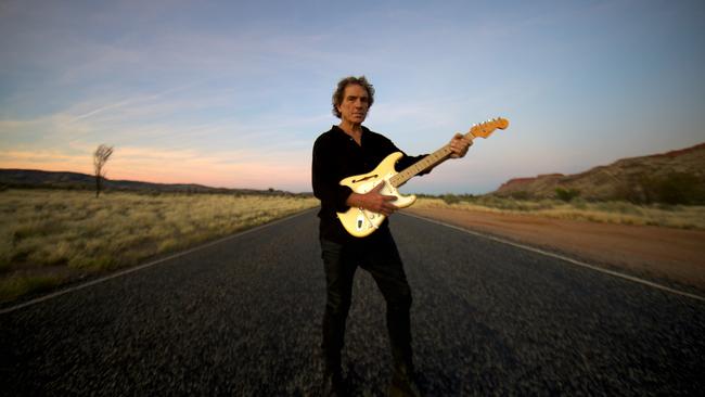 Australian singer, songwriter and guitarist Ian Moss, whose eighth solo album 'Rivers Run Dry' was released in 2023. Ian is pictured here on Larapinta Drive, outside of Alice Springs, Northern Territory, in October 2022. Picture: Robert Hambling