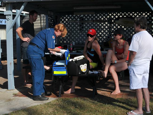 Tessa Kemp is treated after being attacked by Dingoes on Fraser Island. Pic: Luke McGoven