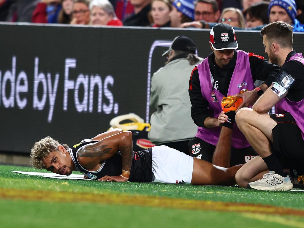 Liam Henry is assessed late in St Kilda’s loss to Brisbane Lions. Picture: Chris Hyde/AFL Photos/via Getty Images