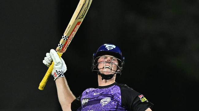 HOBART, AUSTRALIA - JANUARY 27: Mitch Owen of the Hurricanes celebrates scoring a century during the BBL The Final match between Hobart Hurricanes and Sydney Thunder at Ninja Stadium on January 27, 2025 in Hobart, Australia. (Photo by Steve Bell/Getty Images)