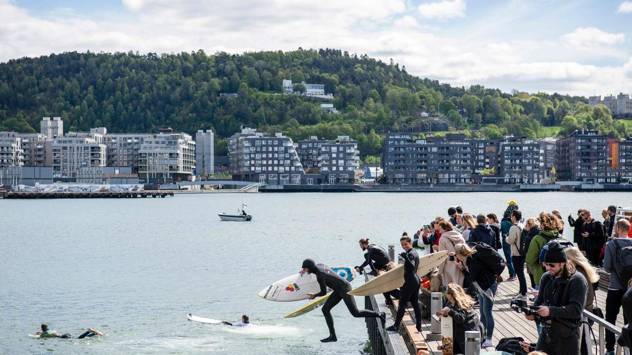 Paddle-out protesters take to Oslo harbour to demonstrate against a planned oil exploration by Equinor in the The Great Australian Bight. Photo: Ola Vatn AFP.