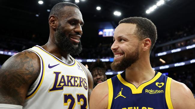 SAN FRANCISCO, CALIFORNIA - JANUARY 27: LeBron James #23 of the Los Angeles Lakers and Stephen Curry #30 of the Golden State Warriors talk to each other after the Lakers beat the Warriors in double overtime at Chase Center on January 27, 2024 in San Francisco, California. NOTE TO USER: User expressly acknowledges and agrees that, by downloading and or using this photograph, User is consenting to the terms and conditions of the Getty Images License Agreement. (Photo by Ezra Shaw/Getty Images)