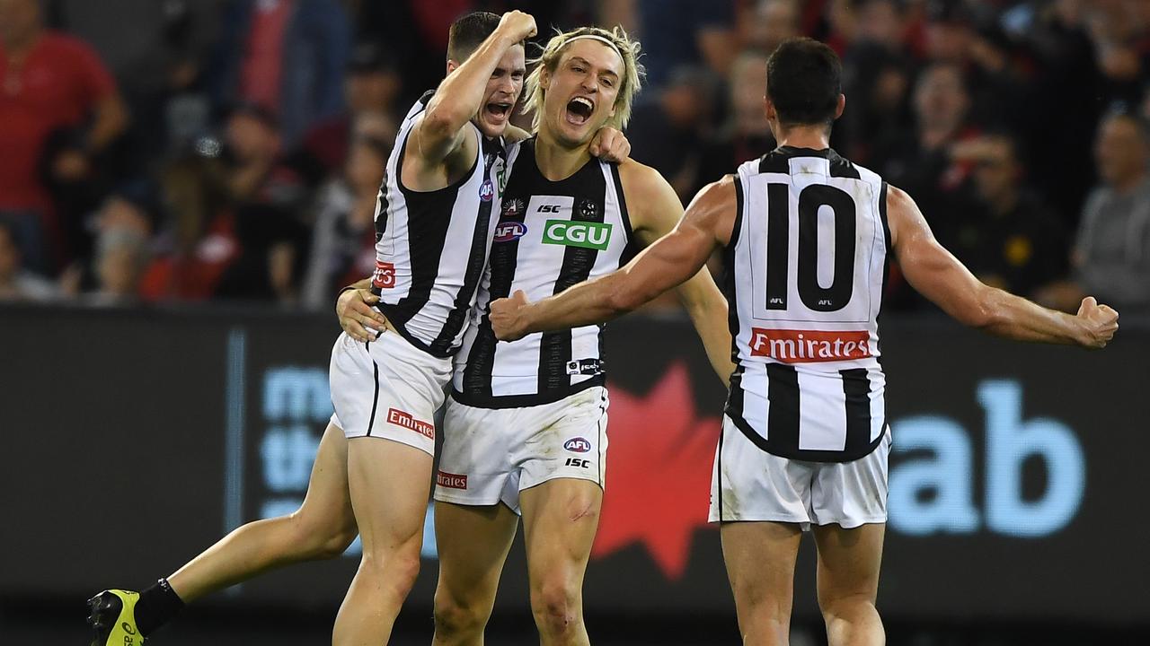 Collingwood players celebrate a goal during the last Anzac Day clash in 2019. Picture: AAP Images