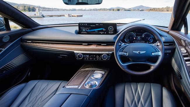 Inside the luxurious cabin of the Genesis G80 Electrified Lux model.