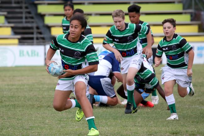 Wanderers Cairns junior player Ezalle Matautia pictured in 2019 playing rugby in far north Queensland in the under-12s. Picture: Anna Rogers.