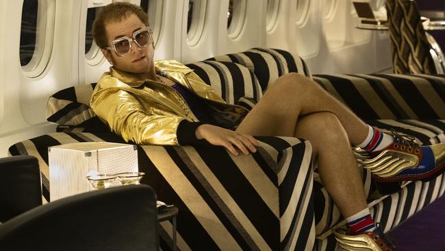 Taron Egerton as Elton John in a scene from Rocketman.