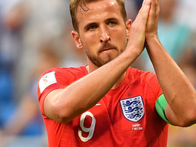 England's forward Harry Kane applauds at the end of the Russia 2018 World Cup quarter-final football match between Sweden and England at the Samara Arena in Samara on July 7, 2018. / AFP PHOTO / Yuri CORTEZ / RESTRICTED TO EDITORIAL USE - NO MOBILE PUSH ALERTS/DOWNLOADS