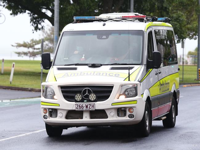 A Queensland ambulance leaves the Cairns Hospital on the Cairns Esplanade. Picture: Brendan Radke