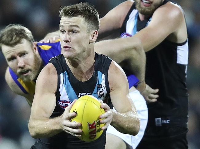 AFL - Port Adelaide v West Coast Eagles - Round 7 - Adelaide Oval. Robbie Gray underpressure. Picture Sarah Reed