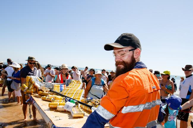 Cleaning up after at the 2019 Beer Can Regatta at Mindel Beach. Pic Glenn Campbell