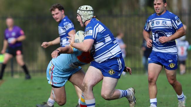 Front rower Marcus Moore charges up field for the Butchers. Picture: Steve Montgomery | OurFootyTeam