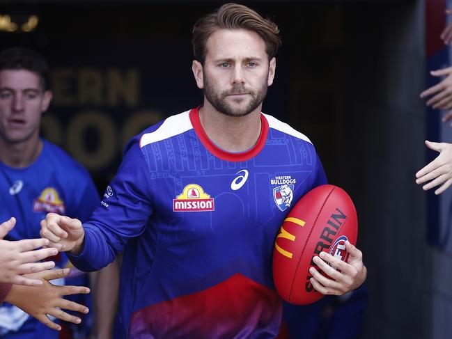 BALLARAT, AUSTRALIA - MARCH 24: Caleb Daniel of the Bulldogs runs out for warm up before the round two AFL match between Western Bulldogs and Gold Coast Suns at Mars Stadium, on March 24, 2024, in Ballarat, Australia. (Photo by Daniel Pockett/Getty Images)