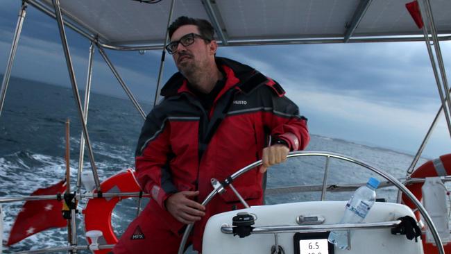 Steven Humphris, 40, at the helm during the Sydney Gold Coast Yacht Race aboard Ocean Gem. Photo: Shaya Laughlin