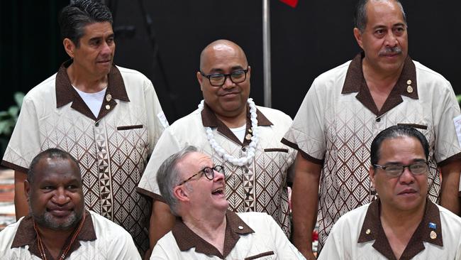 Anthony Albanese speaks to Pacific leaders during a family photo at the start of the plenary session at the 53rd Pacific Islands Forum Leaders Meeting in Nuku'alofa, Tonga. Picture: AAP