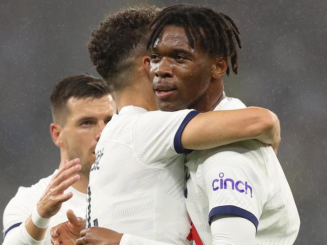 Spurs left back Destiny Udogie celebrates a goal against West Ham with Ivan Perisic. Picture: Paul Kane/Getty Images