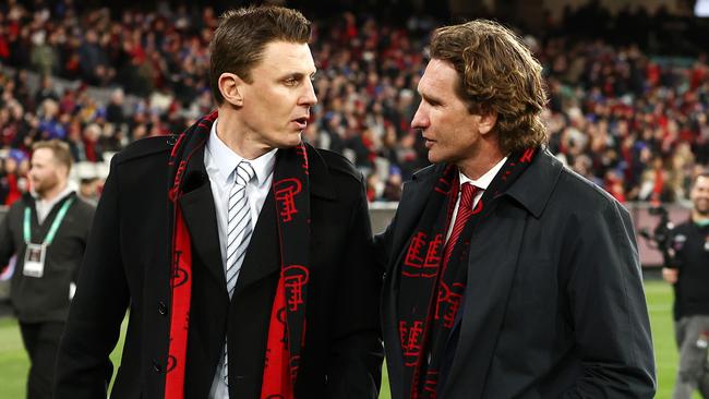 Matthew Lloyd, pictured right speaking to fellow Bombers great James Hird, isn’t convinced Ben Rutten is the right man to coach Essendon. Picture: Michael Klein