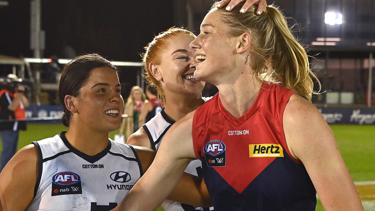 Tayla Harris hugs some of her former teammates after the game. Picture: Getty Images