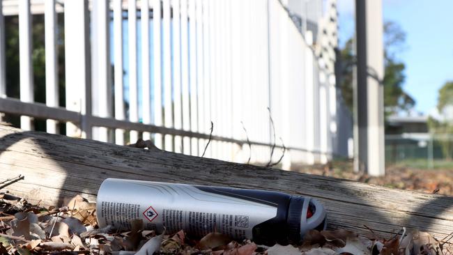 A discarded deodorant can found at a Brisbane train station where there had been reports of people chroming. Picture: AAP/David Clark