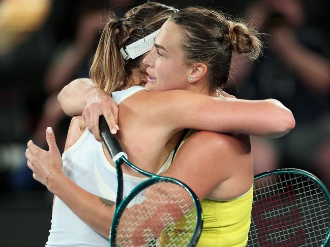 Belarus' Aryna Sabalenka (R) embraces Spain's Paula Badosa post-match. Picture: Martin KEEP / AFP