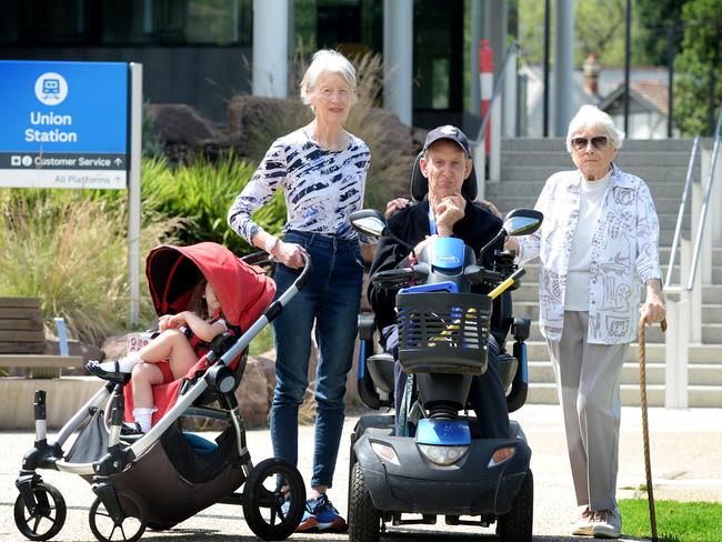 Surrey Hills residents Elizabeth Etty-Leal, Bill Gray and Elizabeth Meredith at Union Station where the lifts stop working during hot weather. Picture: Andrew Henshaw