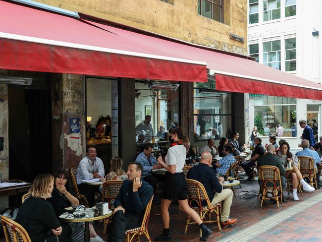 Density levels in hospitality venues will also be scrapped. People are pictured dining in Hardware Lane in Melbourne’s CBD. Picture: Ian Currie