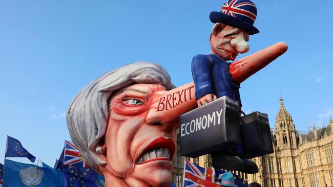 Anti-Brexit activists demonstrate outside the House of Commons. Picture: AFP.