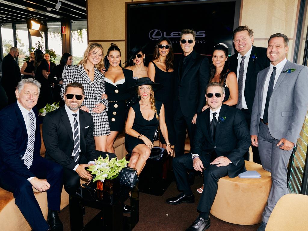 The group of friends – including Phillips, Pataky, Damon and MacPherson – were all smiles as they posed in the marquee. Picture: Magner Media