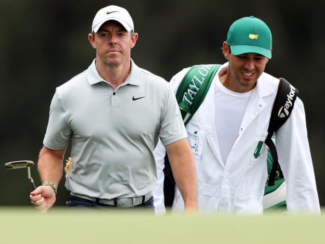 Rory McIlroy and caddie Harry Diamond walk up the 18th green during the second round of the 2023 Masters Tournament. Picture: Christian Petersen/Getty Images