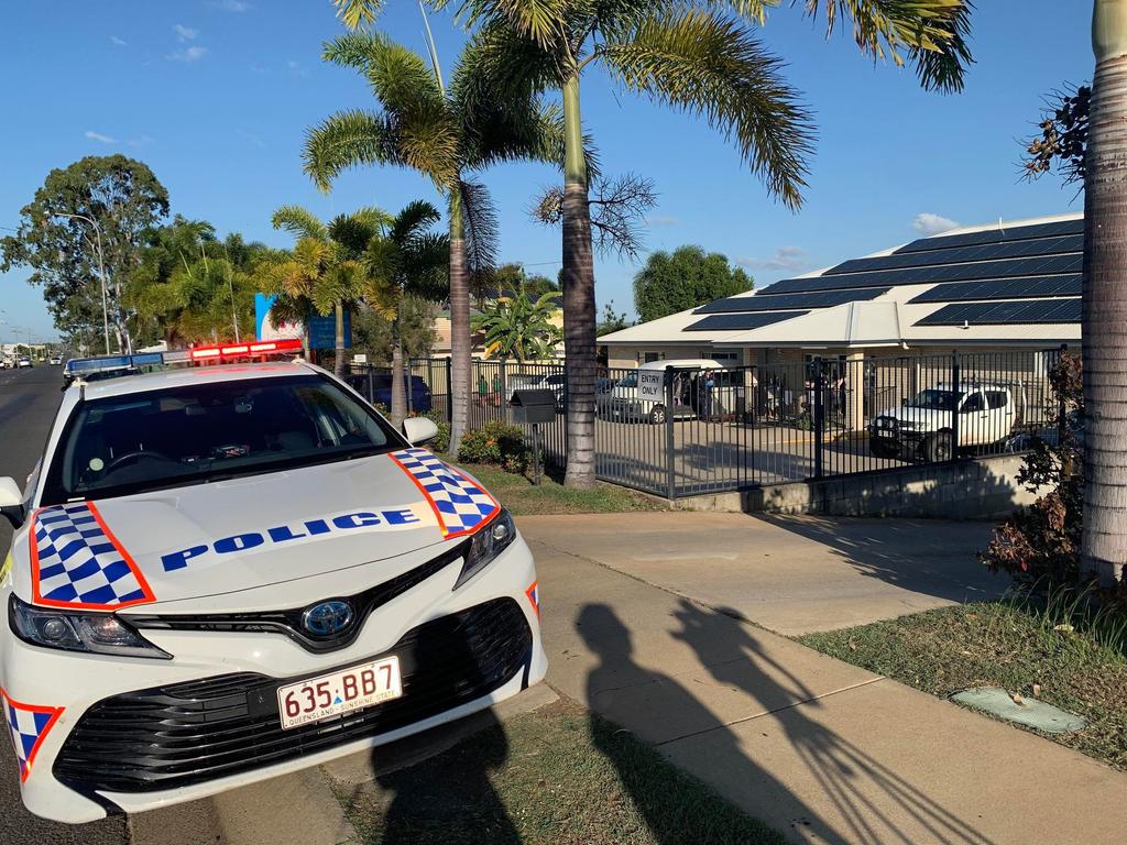 Police at the scene in Gracemere where a child was found in critical condition on a parked bus.
