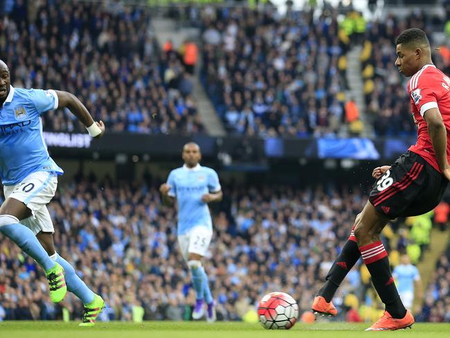 United’s Marcus Rashford scores.